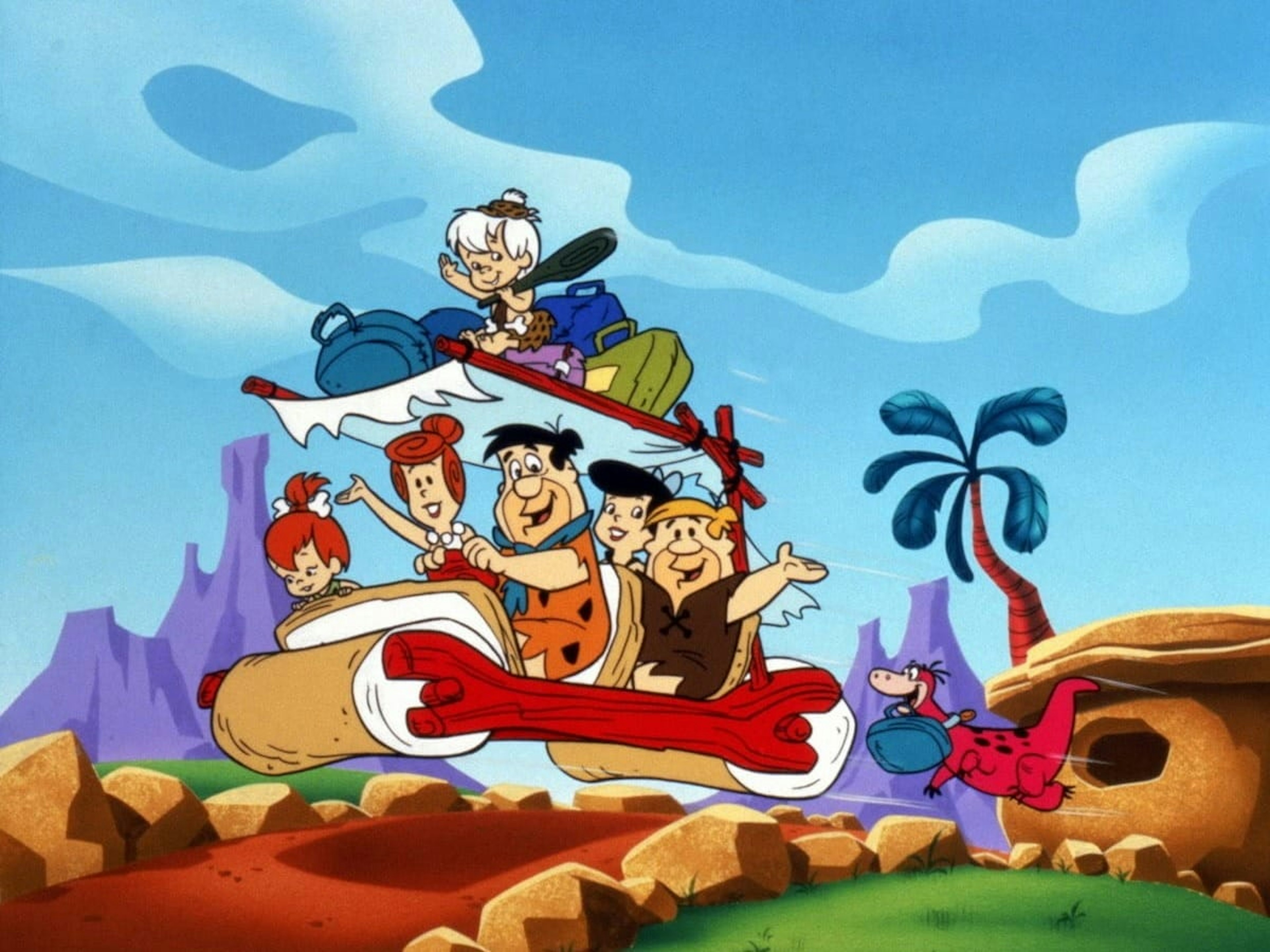 Which classic sitcom is often cited as the inspiration for 'The Flintstones'?