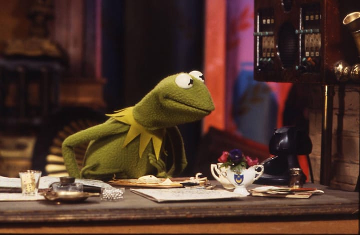 What was the first Kermit the Frog puppet made out of?